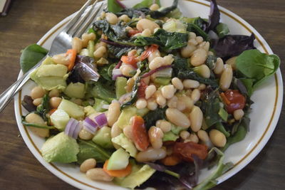 High angle view of salad in bowl on table