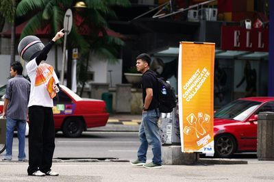 Woman walking on street