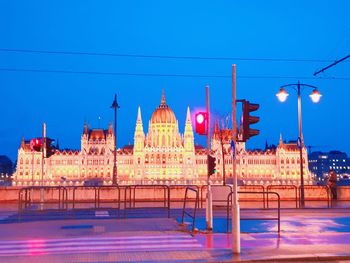 Buildings in city at night