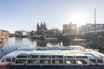 View of building by canal in city