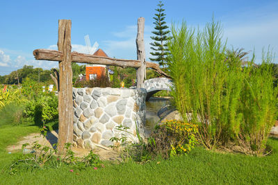 Built structure on field against sky