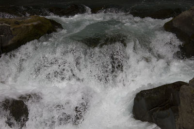 Waves splashing on rocks