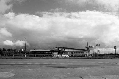 Airport runway against sky