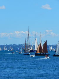 Boats sailing in sea