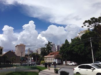 City street against cloudy sky