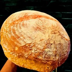 Close-up of hand holding bread