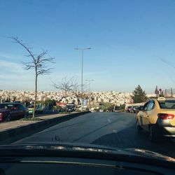 Traffic on road seen through car windshield