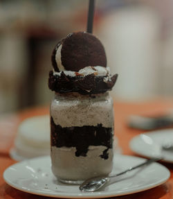 Close-up of ice cream in glass on table