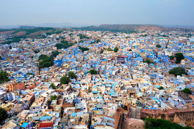High angle view of townscape against sky in city