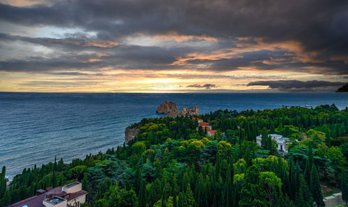 Scenic view of sea against sky during sunset