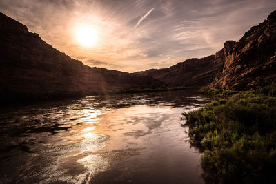 Scenic view of lake at sunset
