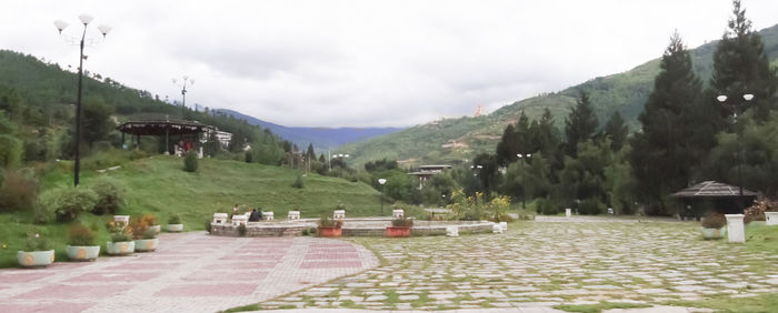 Scenic view of mountain against cloudy sky