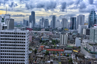 Modern buildings in city against sky