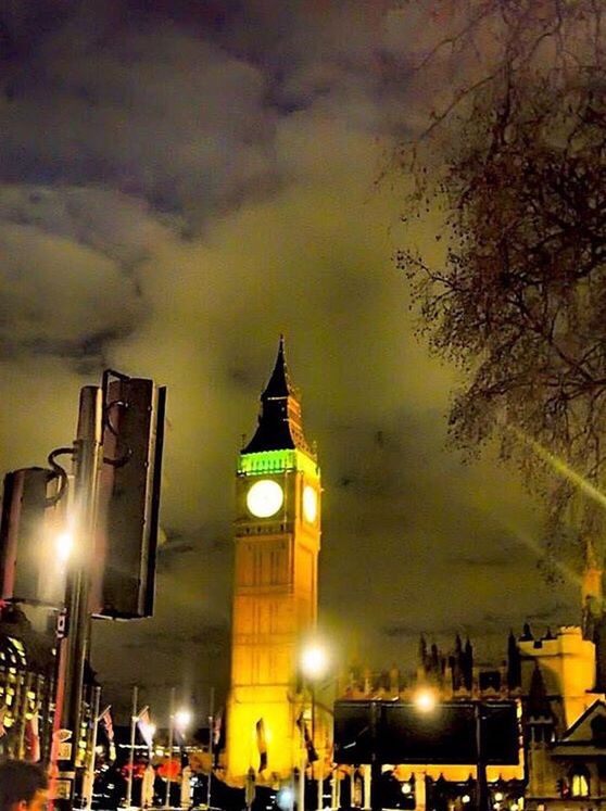 building exterior, architecture, built structure, illuminated, travel destinations, street light, tourism, low angle view, night, city, dusk, church, sky, famous place, history, cloud - sky, outdoors, place of worship, old town, city life, spire, tall - high