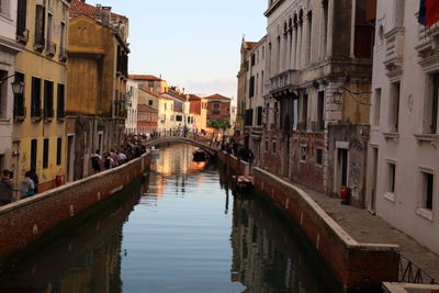 Canal amidst buildings in city