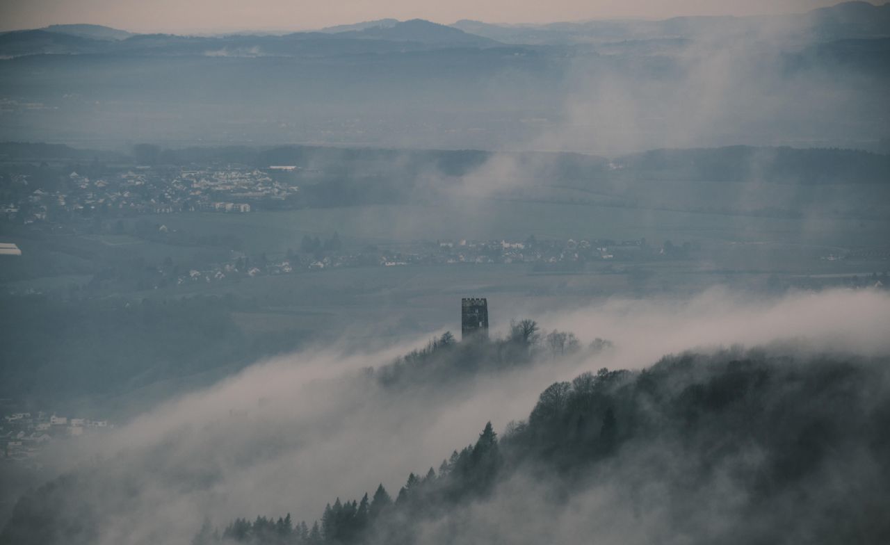 fog, scenics - nature, beauty in nature, sky, cloud - sky, building exterior, environment, architecture, nature, high angle view, no people, tranquil scene, built structure, tranquility, landscape, mountain, day, aerial view, outdoors, cityscape, hazy