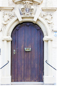 Closed door of ornate building