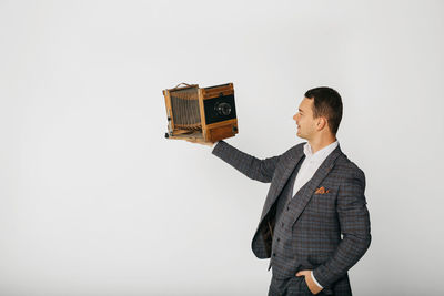 Man standing against white background