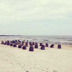 View of beach against cloudy sky