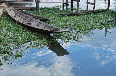 High angle view of boat floating on lake