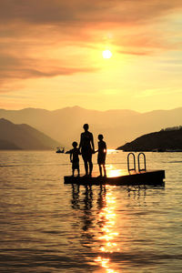Tourists enjoying at sunset