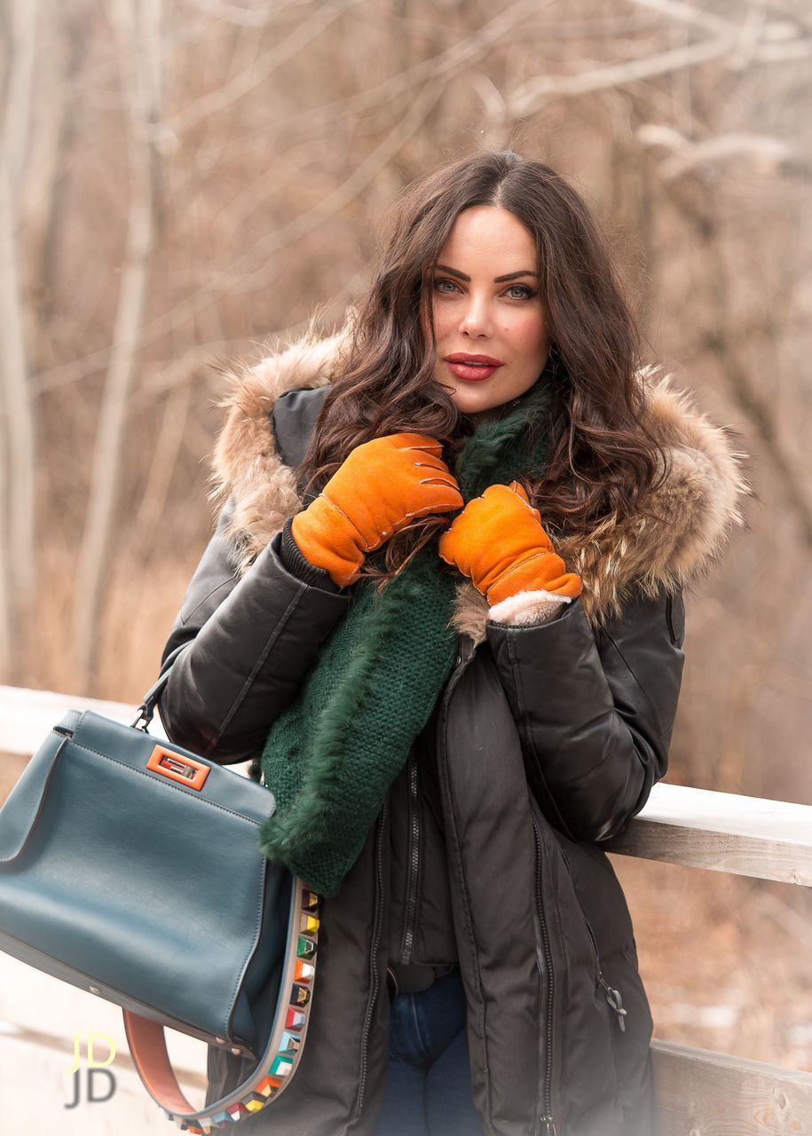 YOUNG WOMAN WEARING MASK IN WINTER