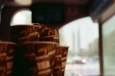 Cups stacked inside a bus station