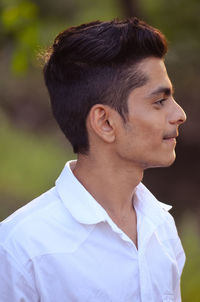 Close-up of young man looking away