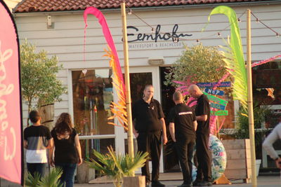 Group of people in front of building