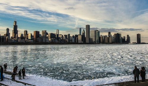 City skyline with sea in background