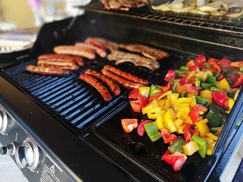 Close-up of meat on barbecue grill