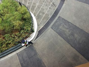 High angle view of people walking on floor