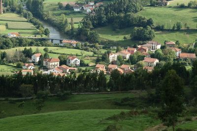 High angle view of agricultural field and houses