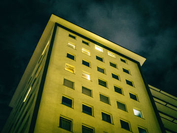 Low angle view of building against sky at night