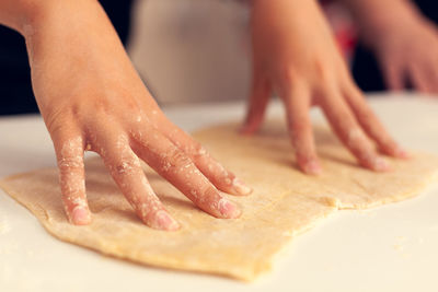 Close-up of woman preparing food