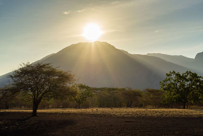 Scenic view of landscape against sky during sunset