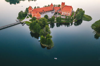 High angle view of lake by building against sky