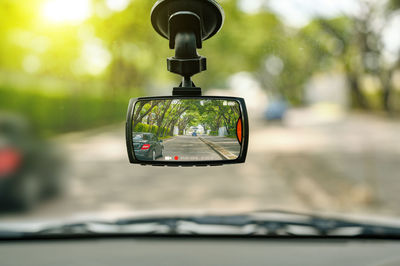 Close-up of digital camera in car