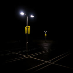 Illuminated street light at night