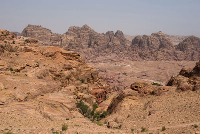 Rock formations in desert against sky