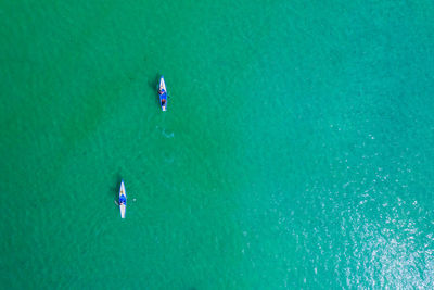 High angle view of people in sea