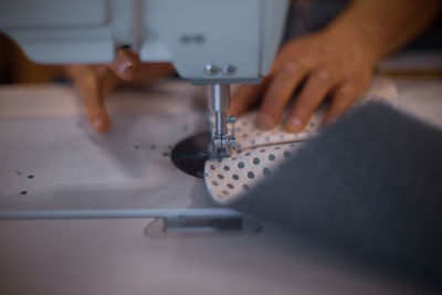 Midsection of woman working on table