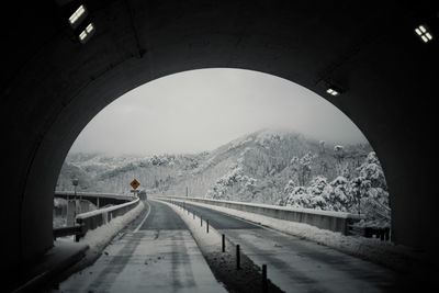 Scenic view of snow covered tunnel