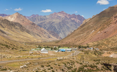 Scenic view of landscape and mountains against sky