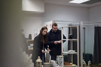 Couple shopping in department store