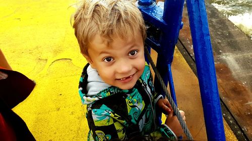 High angle view of boy on play equipment