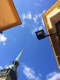 Low angle view of building against blue sky