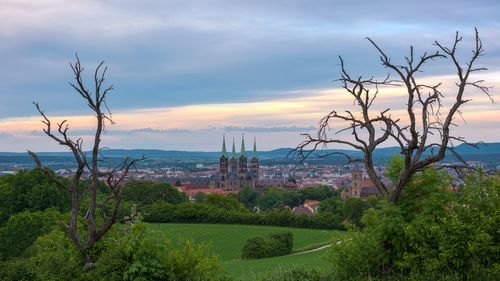 Scenic view of landscape against cloudy sky