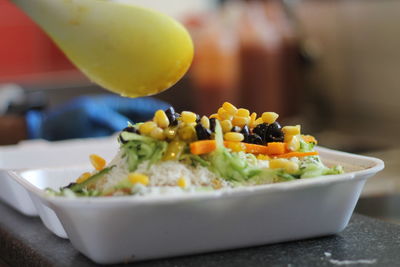 Close-up of fruits in plate on table