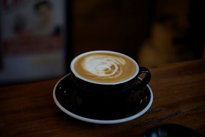 Close-up of cappuccino on table